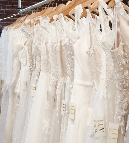 Photo of the white bridal gowns. Desktop Image