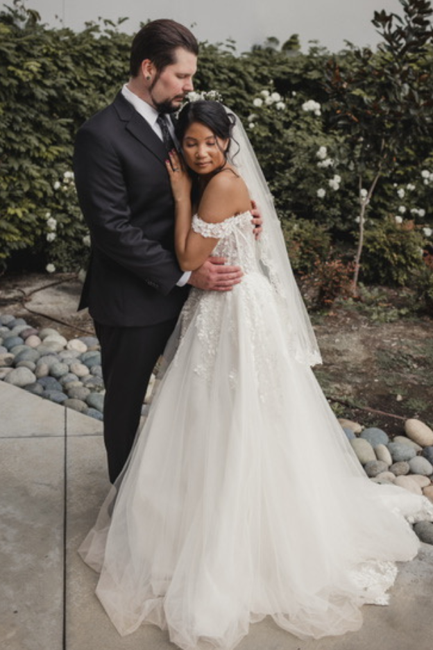 Tatiana Crafton wearing symphony wedding dress by mia Solano bridal designer